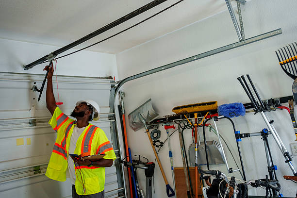 Professional Garage Door Maintenance technician working in Devon, PA